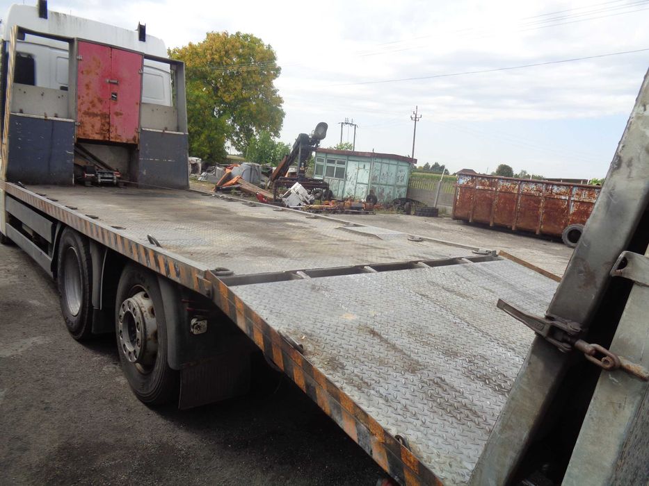 Transport maszyn pojazdów usługi transportowe Autolaweta Pomoc drogowa