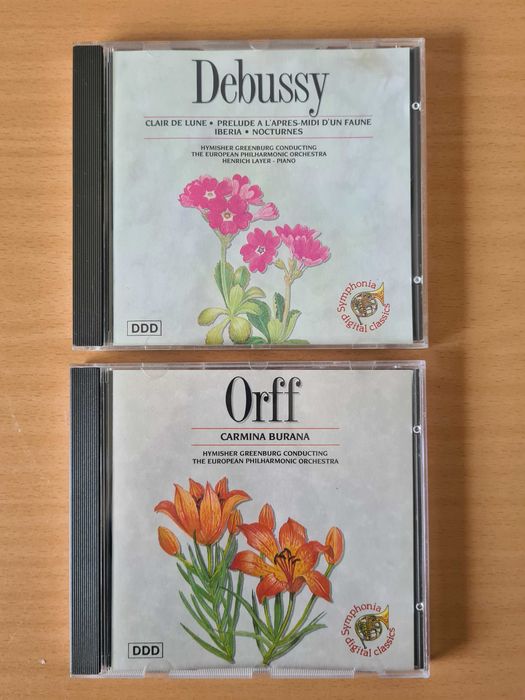 2 CDs audio com música de Debussy e Orff