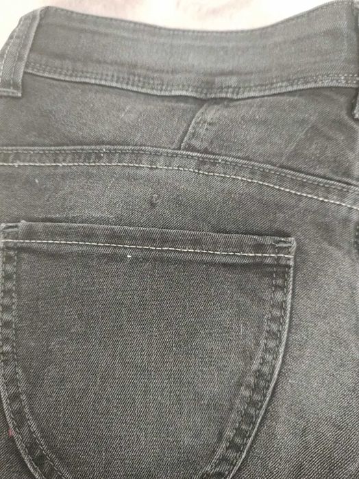 czarne jeansy W 27 L 32