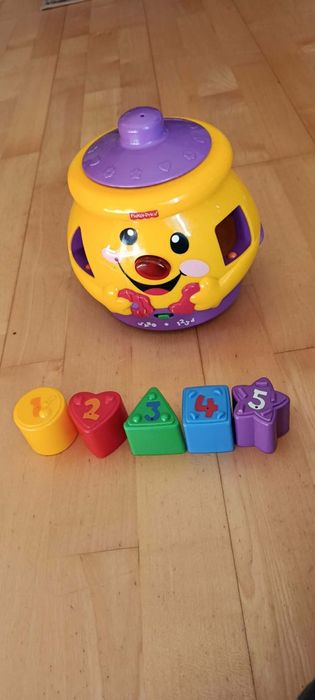 Garnuszek Fischer Price