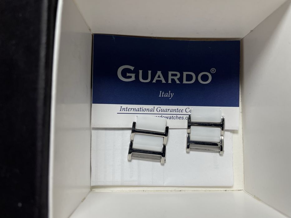 Керамічний годинник Guardo