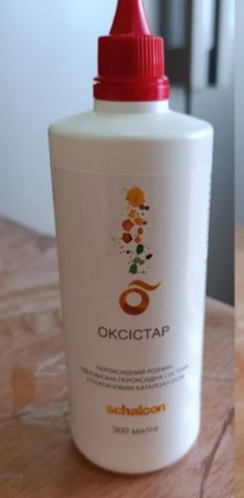 Пероксидний розчин для лінз оксістар.  В бутилочці більше половини