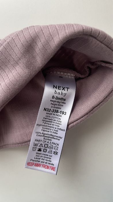 Шапочка від next нова