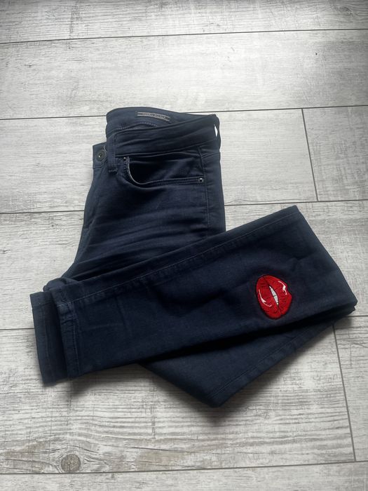 10 par jeansów Guess Hilfiger Armani Trussardi DKNY