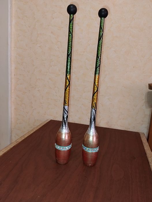 Обмотую обручі і булави