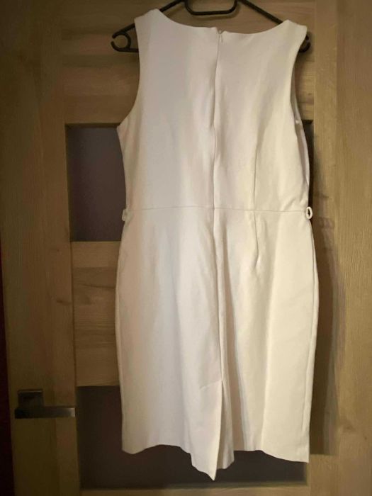 Biała sukienka z Mango rozmiar L.