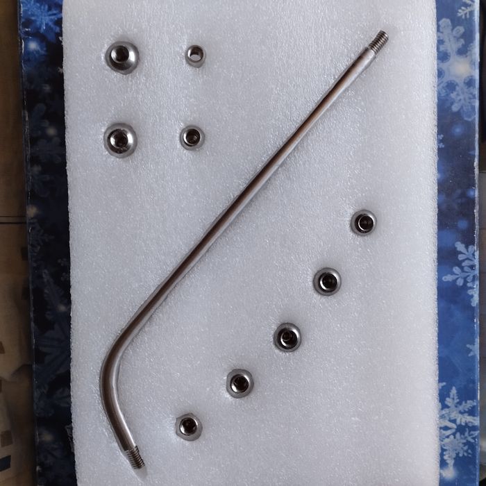 Инструмент для выравнивания вмятин на саксофоне.