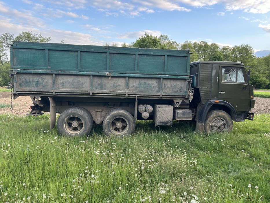 Камаз самоскид з причепом.