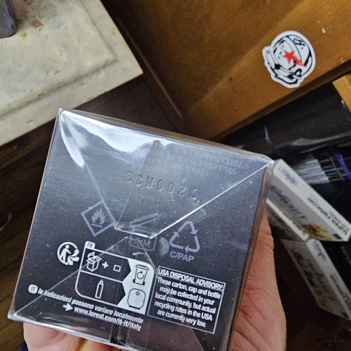 Vendo Armani code parfum 50ml recarregável e garrafa recarregável 150m