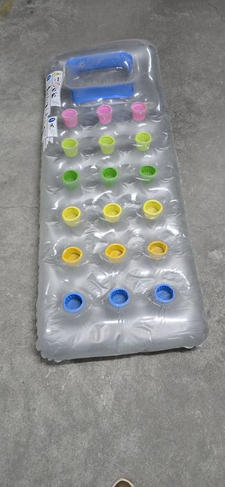 Boia e colchão de praia