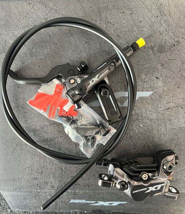 Shimano Deore XT BL-M8100 + BR-M8120 – hamulec hydrauliczny 4-tłoczkowy Lewy / Przód NOWY