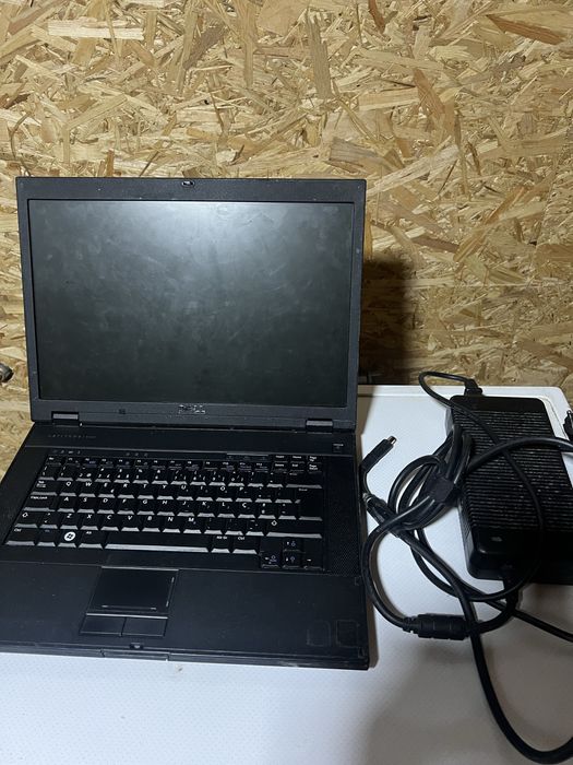 Dell Laptop with Charger and Faulty Battery64751091514499123