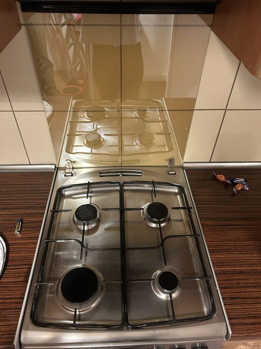 Kuchenka gazowo-elektryczna Amica srebrna wolnostojąca