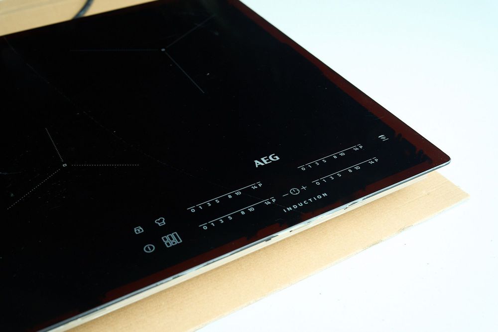 Płyta indukcyjna AEG IKE74471IB - sprawna + pęknięte szkło + gwar.