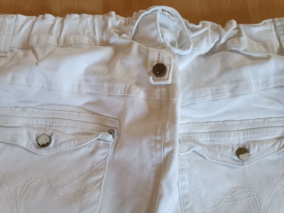 Białe spodnie damskie 52