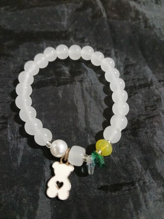 Pulseira elástica com pendente urso