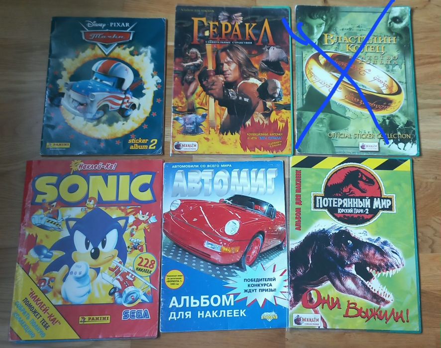 Альбоми з наклейками (panini, topps, merlin)