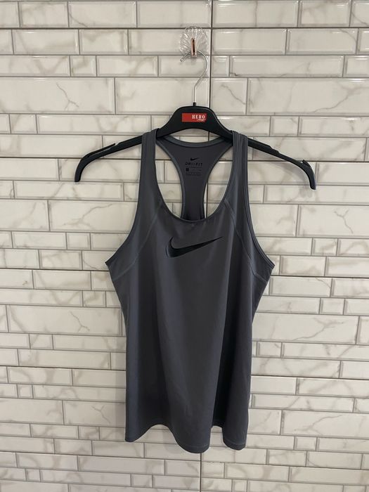 Жіночі спортивні футболки,майки  Nike,Puma,Adidas,Reebok
