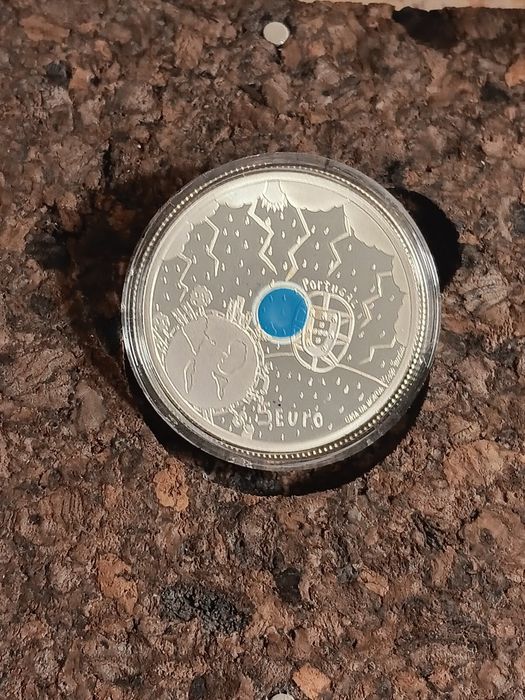 3 moedas prata prof de 5€ . O  Clima