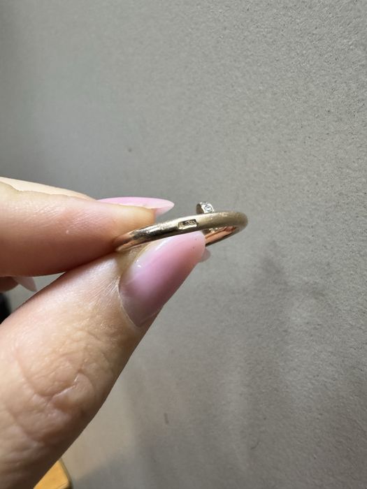 Золоте кільце cartier