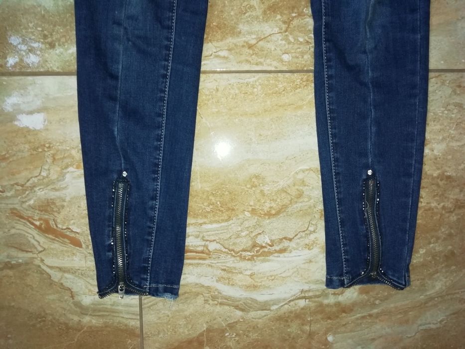 Spodnie jeans rurki zamki 36