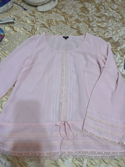 Подарую блузку Xl