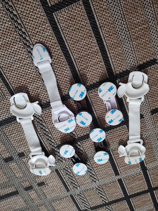 zabezpieczenia do szafek różne