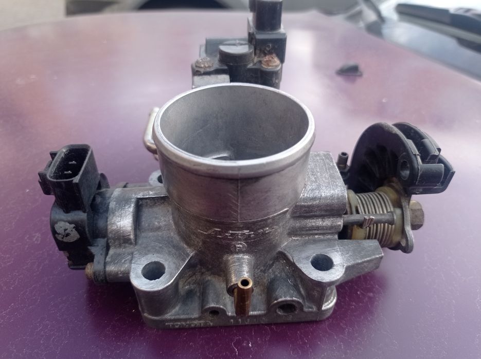 Продам Дроссельную заслонку TOYOTA 4E-FE