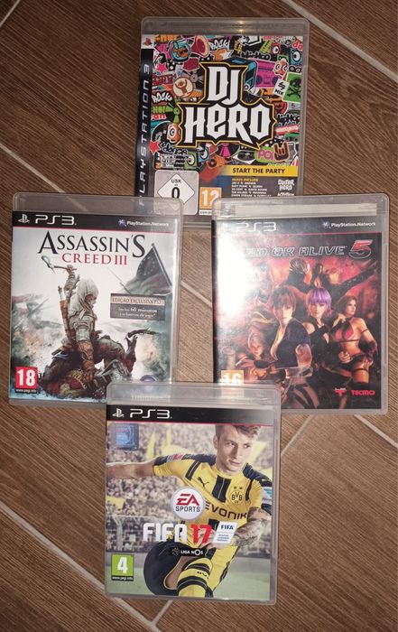 PS3 com comando + DJ HERO com 4 jogos