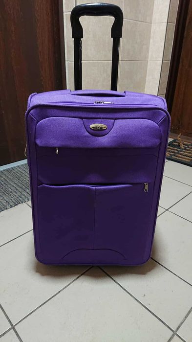 Walizka Samsonite fioletowa dwa koła jezdne