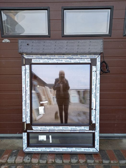 Nowe okno brązowe z roletą zewnętrzną elektryczną 106x152 DOWÓZ KRAJ