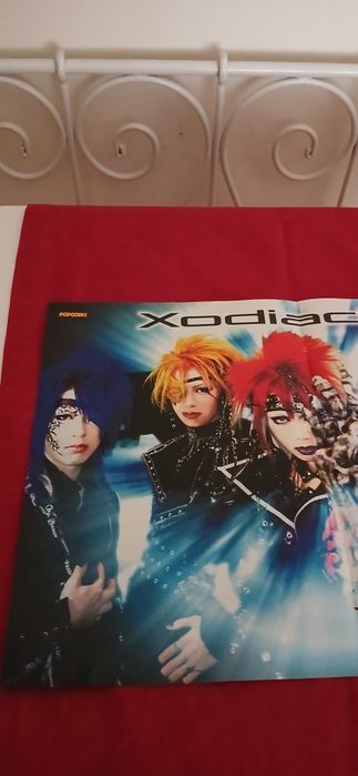 Poster Xodiack, da Popcorn
