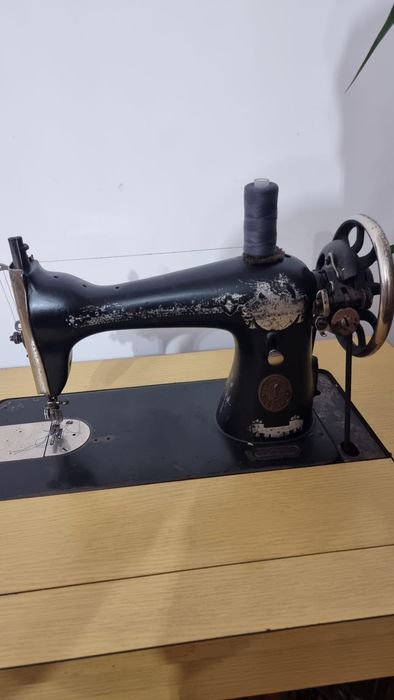 Máquina costura singer
