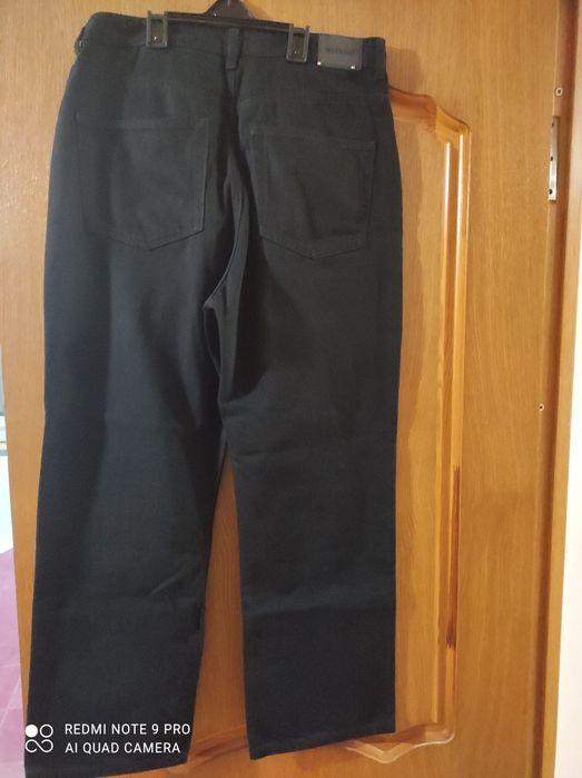 Нові чорні широкі джинси на хлопця р. 164