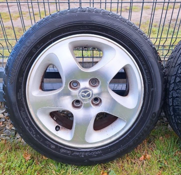 Oryginalne Alufelgi 15" cali Mazda 323F BJ 2001r.