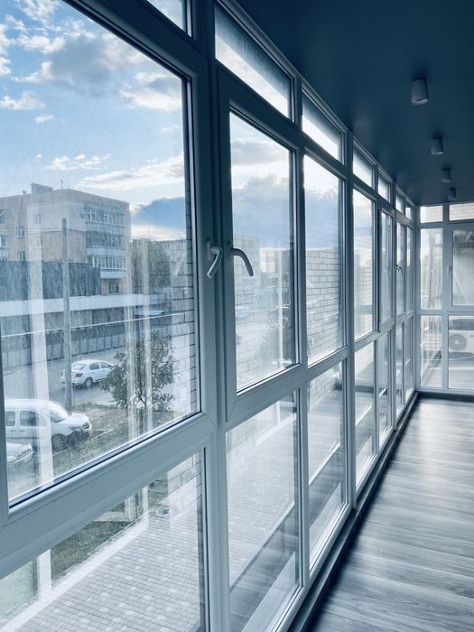 Тонування вікон, балконів, фасадів. Бронювання вікон.