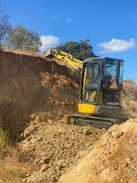 Limpeza de terrenos, demolições, construção civil