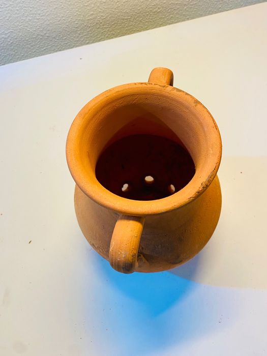 Assador de castanhas de barro