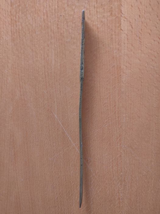 Abridor de cartas em bronze.