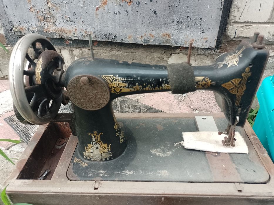 Швейная машинка Сингер