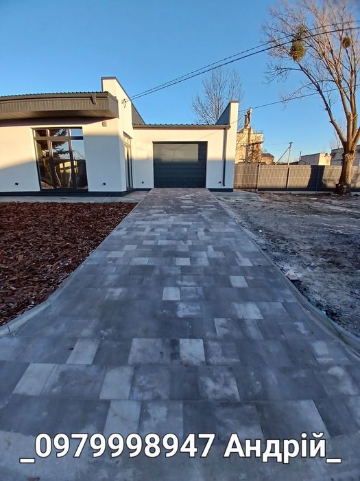 Укладня бруківки, (тротуарної плитки))