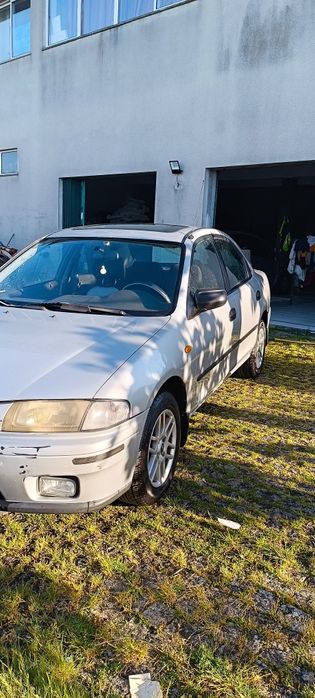 Mazda 323 pequeno problema no motor505918848972236802