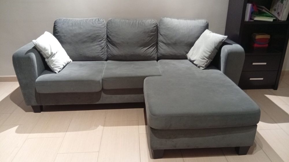 Sofá cinza com chaise long