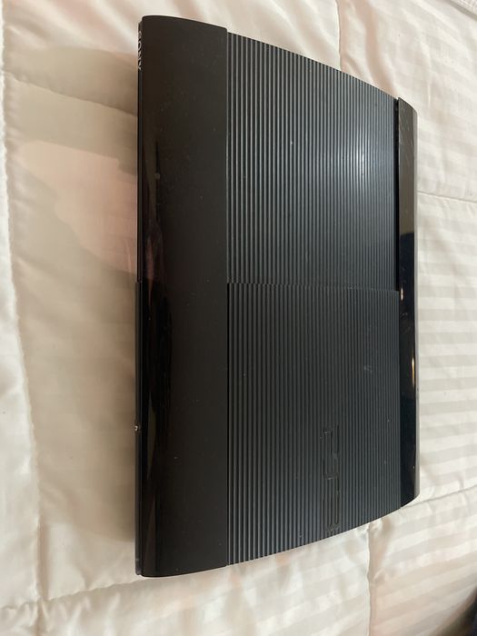 PlayStation 3 Super Slim Model with Two Controllers64409178186627121