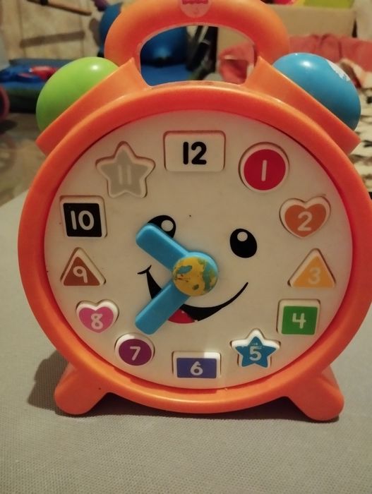 Дитячі іграшка годинник