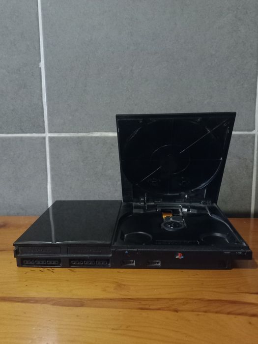 Ps2 slim + comando + 32 jogos