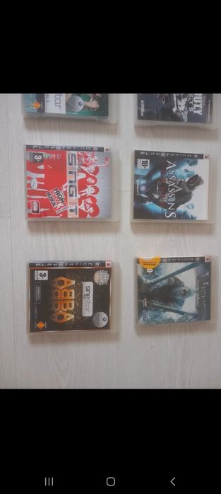 Playstation 3 com comando e jogos