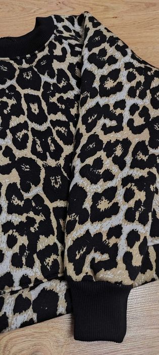 Тепла кофта на дівчинку 8-9 років