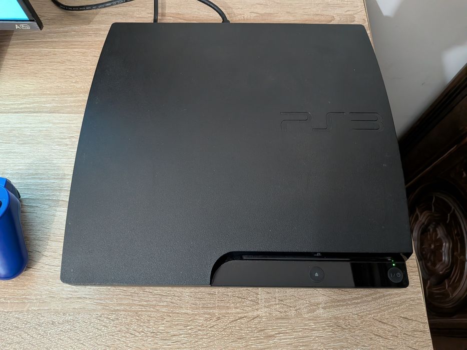 PS3 Slim 300GB em bom estado