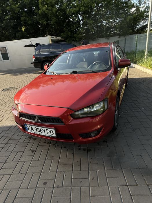 Lancer 10 2011 2.0 автомат / газ